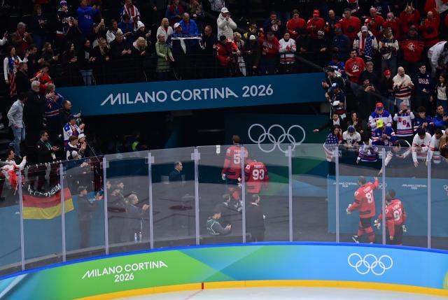 (260222) -- MILAN, Feb. 22, 2026 (Xinhua) -- Sidney Crosby (3rd R, front) of Canada leaves after the ice hockey men's gold medal game between Canada and the United States at the Milan-Cortina 2026 Olympic Winter Games in Milan, Italy, Feb. 22, 2026. (Xinhua/Tao Xiyi)