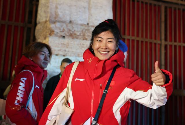 (260222) -- VERONA, Feb. 22, 2026 (Xinhua) -- Xu Mengtao of China gestures after the closing ceremony of the Milan-Cortina 2026 Olympic Winter Games at Verona Olympic Arena in Verona, Italy, Feb. 22, 2026. (Xinhua/Wang Kaiyan)