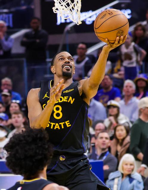 (260223) -- SAN FRANCISCO, Feb. 23, 2026 (Xinhua) -- De'Anthony Melton of Golden State Warriors goes for a layup during the 2025-2026 NBA regular season game between Golden State Warriors and Denver Nuggets in San Francisco, the United States, Feb. 22, 2026. (Photo by Arthur Dong/Xinhua)