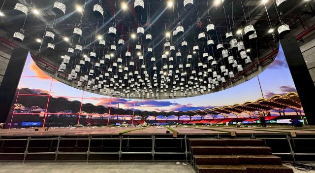 (260223) -- DEQING, Feb. 23, 2026 (Xinhua) -- This photo taken on Nov. 26, 2025 shows a virtual scene of the main stadium of Hong Kong's Kai Tak Sports Park at Versatile Media's AI virtual film base in Deqing, east China's Zhejiang Province. TO GO WITH "Across China: AI-powered virtual technologies elevate Chinese filmmaking via grand realism, efficiency" (Versatile Media/Handout via Xinhua)