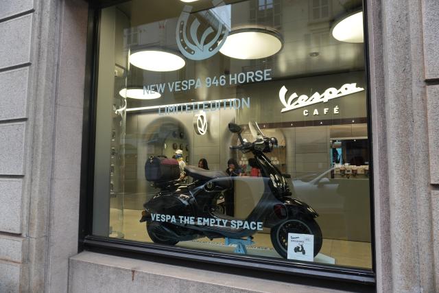 (260223) -- MILAN, Feb. 23, 2026 (Xinhua) -- The Year of the Horse limited edition of Italian scooter brand Vespa is seen in the front window of the brand's experience space in Milan, Italy, Feb. 19, 2026. TO GO WITH "Feature: Italian businesses tap China's Spring Festival economy" (Xinhua/Zhang Xinwen)