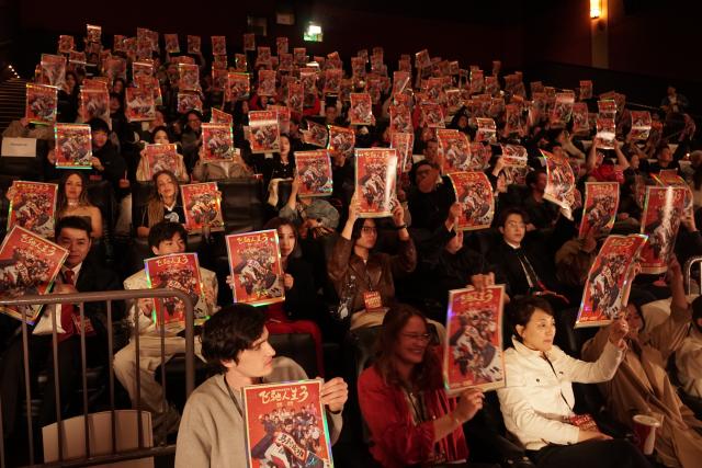 (260223) -- LOS ANGELES, Feb. 23, 2026 (Xinhua) -- Moviegoers attend the North American premiere of the Chinese film "Pegasus 3" at a cinema in Los Angeles, California, the United States, on Feb. 22, 2026. "Pegasus 3," the latest installment in Han Han's blockbuster car racing comedy franchise, is set to be released in North America on Feb. 27. (Photo by Zeng Hui/Xinhua)