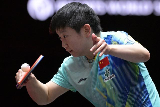 (260223) -- SINGAPORE, Feb. 23, 2026 (Xinhua) -- Sun Yingsha of China hits a return during the women's singles round of 64 match between Sun Yingsha of China and Orawan Paranang of Thailand at the World Table Tennis (WTT) Singapore Smash 2026 in Singapore on Feb. 23, 2026. (Photo by Then Chih Wey/Xinhua)