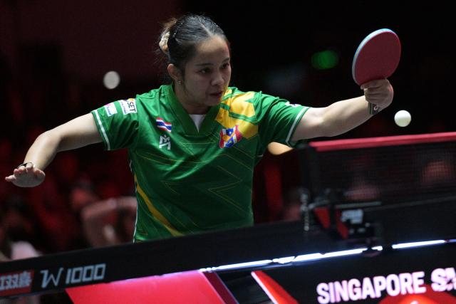 (260223) -- SINGAPORE, Feb. 23, 2026 (Xinhua) -- Orawan Paranang of Thailand hits a return during the women's singles round of 64 match between Sun Yingsha of China and Orawan Paranang of Thailand at the World Table Tennis (WTT) Singapore Smash 2026 in Singapore on Feb. 23, 2026. (Photo by Then Chih Wey/Xinhua)