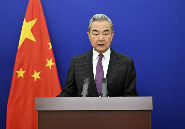(260223) -- BEIJING, Feb. 23, 2026 (Xinhua) -- Chinese Foreign Minister Wang Yi, also a member of the Political Bureau of the Communist Party of China Central Committee, gives a speech via video link at the high-level segment of the 61st session of the United Nations Human Rights Council, in Beijing, capital of China, on Feb. 23, 2026. (Xinhua/Yin Bogu)
