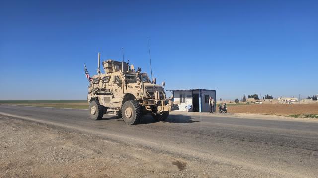 (260223) -- HASAKAH, Feb. 23, 2026 (Xinhua) -- U.S. troops are seen withdrawing from the Qasrak military base in Hasakah governorate, Syria, Feb. 23, 2026. U.S. forces have begun withdrawing from the Qasrak military base in Syria's Hasakah governorate and redeploying toward Iraq, Syria TV reported on Monday, not providing further details. (Str/Xinhua)