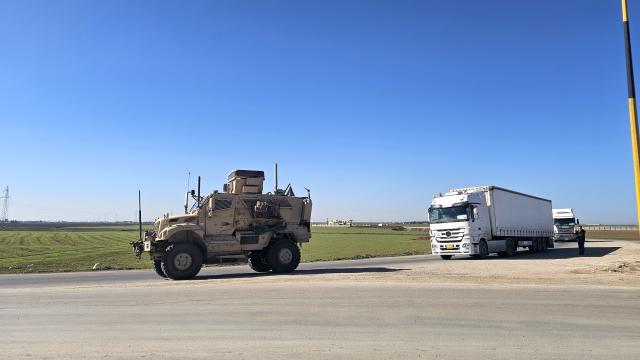 (260223) -- HASAKAH, Feb. 23, 2026 (Xinhua) -- U.S. troops are seen withdrawing from the Qasrak military base in Hasakah governorate, Syria, Feb. 23, 2026. U.S. forces have begun withdrawing from the Qasrak military base in Syria's Hasakah governorate and redeploying toward Iraq, Syria TV reported on Monday, not providing further details. (Str/Xinhua)