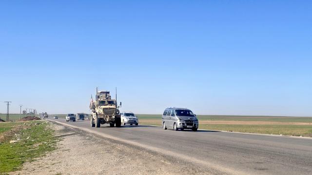 (260223) -- HASAKAH, Feb. 23, 2026 (Xinhua) -- U.S. troops are seen withdrawing from the Qasrak military base in Hasakah governorate, Syria, Feb. 23, 2026. U.S. forces have begun withdrawing from the Qasrak military base in Syria's Hasakah governorate and redeploying toward Iraq, Syria TV reported on Monday, not providing further details. (Str/Xinhua)