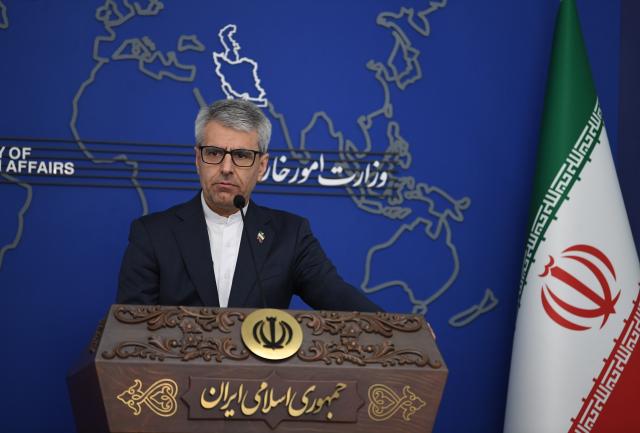 (260223) -- TEHRAN, Feb. 23, 2026 (Xinhua) -- Iranian Foreign Ministry spokesman Esmaeil Baghaei speaks at a weekly press conference in Tehran, Iran, on Feb. 23, 2026. Iranian Foreign Ministry spokesman Esmaeil Baghaei on Monday warned that any attack by the United States against Iran, regardless of its scope and scale, will be considered an act of aggression and followed by consequences. (Xinhua/Shadati)