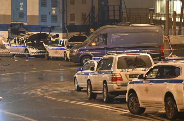(260224) -- MOSCOW, Feb. 24, 2026 (Xinhua) -- Staff members investigate at Savyolovsky Station Square in Moscow, Russia, Feb. 24, 2026. One traffic police officer was killed and two others were injured following the detonation of an unidentified device at Savyolovsky Station Square in Moscow, the Russian Interior Ministry said on Tuesday. (Xinhua/Hao Jianwei)
