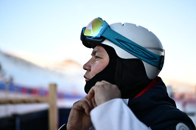 (260224) -- URUMQI, Feb. 24, 2026 (Xinhua) -- Yeersen Shenwohen prepares to ski at a ski resort in Xinyuan County of Ili Kazak Autonomous Prefecture, northwest China's Xinjiang Uygur Autonomous Region, Jan. 7, 2026. TO GO WITH "Xinjiang Story: Retired athlete ignites youth ski dreams, fuels winter economy in China's Xinjiang" (Xinhua/Xin Yuewei)