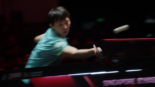 (260224) -- SINGAPORE, Feb. 24, 2026 (Xinhua) -- Wang Manyu of China hits a return during the women's singles round of 32 match between Wang Manyu of China and Cheng I-Ching of Chinese Taipei at the World Table Tennis (WTT) Singapore Smash 2026 in Singapore on Feb. 24, 2026. (Photo by Then Chih Wey/Xinhua)