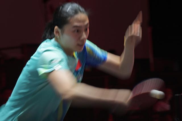 (260224) -- SINGAPORE, Feb. 24, 2026 (Xinhua) -- Chen Yi of China hits a return during the women's singles round of 32 match between Chen Yi of China and Ser Lin Qian of Singapore at the World Table Tennis (WTT) Singapore Smash 2026 in Singapore on Feb. 24, 2026. (Photo by Then Chih Wey/Xinhua)