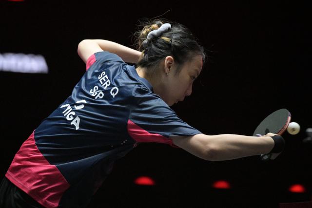 (260224) -- SINGAPORE, Feb. 24, 2026 (Xinhua) -- Ser Lin Qian of Singapore hits a return during the women's singles round of 32 match between Chen Yi of China and Ser Lin Qian of Singapore at the World Table Tennis (WTT) Singapore Smash 2026 in Singapore on Feb. 24, 2026. (Photo by Then Chih Wey/Xinhua)