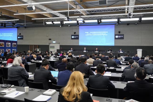 (260224) -- GENEVA, Feb. 24, 2026 (Xinhua) -- This photo shows a scene of a seminar on global governance and the launch ceremony of the English edition of the first volume of "China's Governance Under Xi Jinping's Leadership" at the Palais des Nations in Geneva, Switzerland, Feb. 24, 2026. (Xinhua/Peng Ziyang)