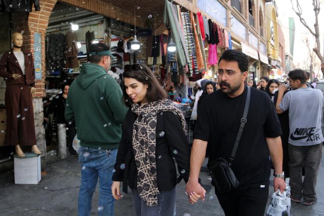 (260224) -- TEHRAN, Feb. 24, 2026 (Xinhua) -- People walk through Grand Bazaar in Tehran, Iran, on Feb. 24, 2026. (Str/Xinhua)