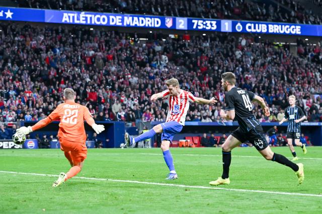 (260225) -- MADRID, Feb. 25, 2026 (Xinhua) -- Alexander Sorloth (C) of Atletico de Madrid scores a goal during the UEFA Champions League knockout play-off second leg match between Atletico de Madrid and Club Brugge in Madrid, Spain, on Feb. 24, 2026. (Photo by Gustavo Valiente/Xinhua)