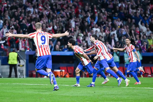 (260225) -- MADRID, Feb. 25, 2026 (Xinhua) -- Players of Atletico de Madrid celebrate a goal during the UEFA Champions League knockout play-off second leg match between Atletico de Madrid and Club Brugge in Madrid, Spain, on Feb. 24, 2026. (Photo by Gustavo Valiente/Xinhua)