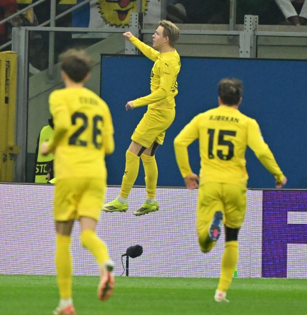 (260225) -- MILAN, Feb. 25, 2026 (Xinhua) -- Bodo/Glimt's Jens Petter Hauge (C) celebrates his goal during the UEFA Champions League play-off second-leg football match between Inter Milan and Bodo/Glimt in Milan, Italy, Feb. 24, 2026. (Photo by Alberto Lingria/Xinhua)
