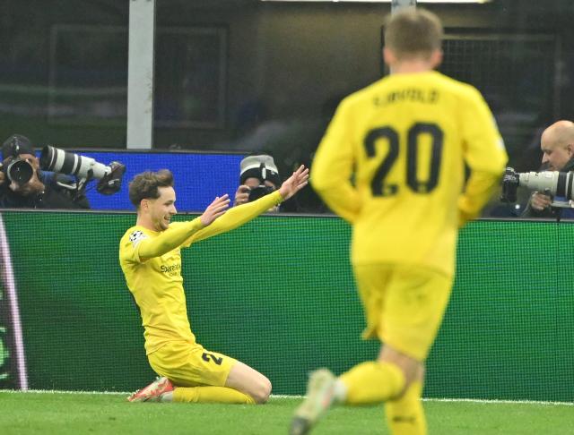(260225) -- MILAN, Feb. 25, 2026 (Xinhua) -- Bodo/Glimt's Hakon Evjen (L) celebrates his goal during the UEFA Champions League play-off second-leg football match between Inter Milan and Bodo/Glimt in Milan, Italy, Feb. 24, 2026. (Photo by Alberto Lingria/Xinhua)