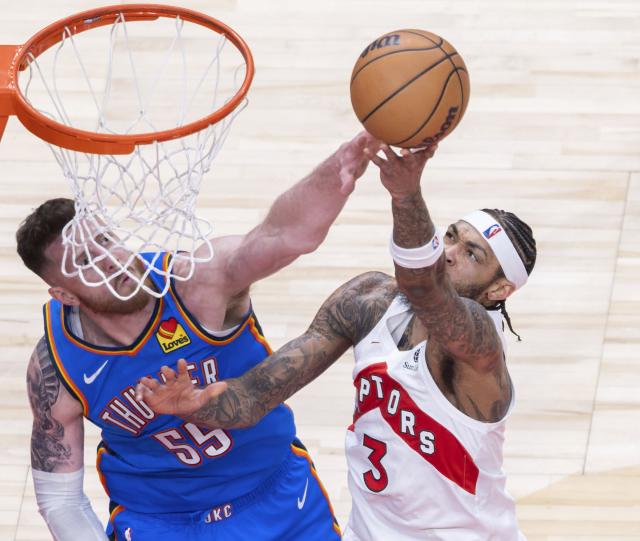 (260225) -- TORONTO, Feb. 25, 2026 (Xinhua) -- Brandon Ingram (R) of Toronto Raptors goes for a layup during the 2025-2026 NBA regular season game between Toronto Raptors and Oklahoma City Thunder in Toronto, Canada, on Feb. 24, 2026. (Photo by Zou Zheng/Xinhua)