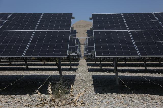 (260225) -- KABUL, Feb. 25, 2026 (Xinhua) -- This photo taken on Feb. 17, 2026 shows solar panels at a solar power plant in Surobi district of Kabul, Afghanistan. TO GO WITH "Feature: Afghanistan seeks solar-driven path to energy self-sufficiency" (Photo by Saifurahman Safi/Xinhua)
