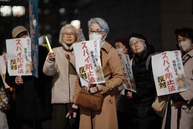 (260225) -- TOKYO, Feb. 25, 2026 (Xinhua) -- People attend a rally in front of the Second Members' Office Building of the House of Representatives in Tokyo, Japan, Feb. 24, 2026. A large crowd of Japanese people gathered Tuesday evening in Tokyo to protest Prime Minister Sanae Takaichi's dangerous push for policies including accelerating constitutional revision, expanding military capabilities and strengthening national intelligence functions, voicing concerns about the country's future direction. (Xinhua/Jia Haocheng)