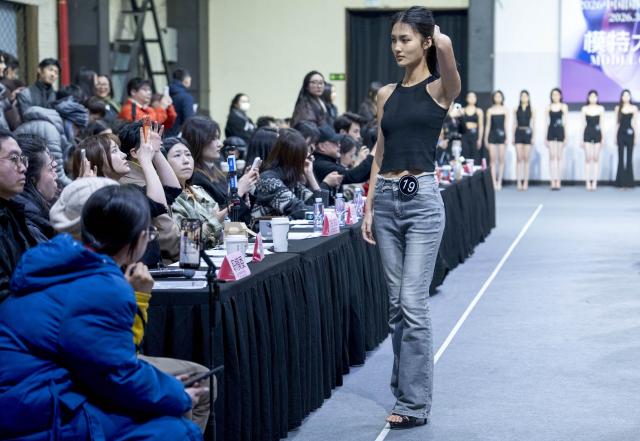 (260227) -- BEIJING, Feb. 27, 2026 (Xinhua) -- A model attends the model casting for the upcoming 2026 China Fashion Week in Beijing, capital of China, Feb. 27, 2026. A model casting for the 2026 China Fashion Week was held here on Friday, during which over 1,500 models competed for walking the runway. The 2026 China Fashion Week (Spring) will be held here from March 20 to 28. (Xinhua/Cai Yang)