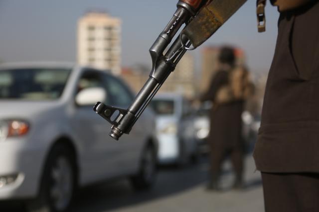 (260227) -- KABUL, Feb. 27, 2026 (Xinhua) -- Security personnel stand guard at a road junction following airstrikes in Kabul, Afghanistan, Feb. 27, 2026. Zabihullah Mujahid, spokesperson for the Afghan government, posted on his X account early Friday that the Pakistani military conducted airstrikes in parts of Kabul, southern Kandahar, and eastern Paktia province. (Photo by Saifurahman Safi/Xinhua)