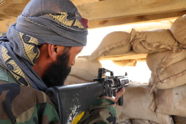 (260227) -- KHOST, Feb. 27, 2026 (Xinhua) -- An Afghan security force member takes part in a military operation against Pakistan in Khost province, Afghanistan, Feb. 27, 2026. TO GO WITH "Clashes break out again along Afghanistan-Pakistan border" (Photo by Yusuf Mangal/Xinhua)