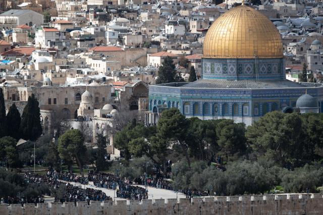 (260227) -- JERUSALEM, Feb. 27, 2026 (Xinhua) -- People attend Friday prayers at the Al-Aqsa Mosque compound during the holy month of Ramadan in Jerusalem's Old City, Feb. 27, 2026. (Xinhua/Chen Junqing)