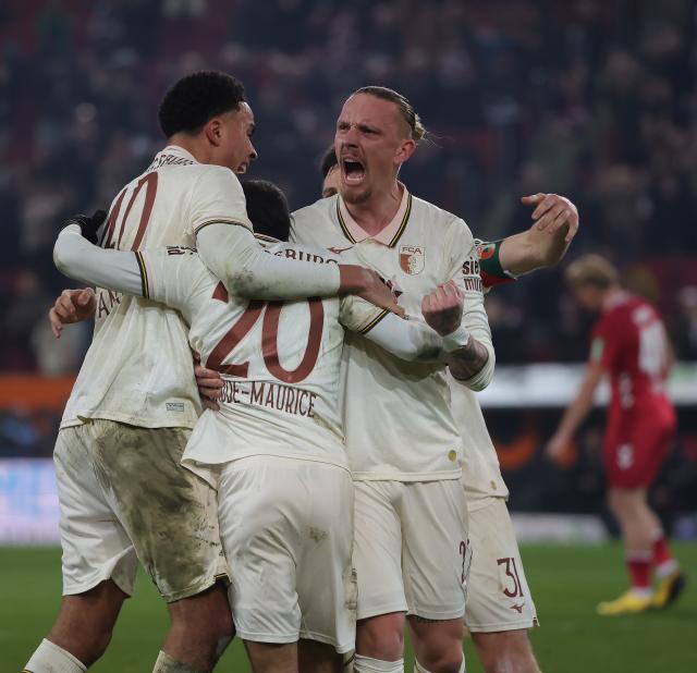 (260228) -- AUGSBURG, Feb. 28, 2026 (Xinhua) -- Players of FC Augsburg celebrate scoring during the German first division Bundesliga football match between FC Augsburg and FC Cologne in Augsburg, Germany, Feb. 27, 2026. (Photo by Philippe Ruiz/Xinhua)