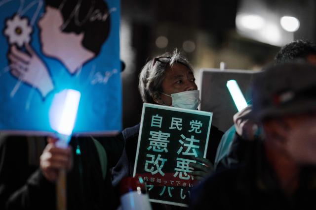 (260228) -- TOKYO, Feb. 28, 2026 (Xinhua) -- People protest during a rally in front of the Prime Minister's Office in Tokyo, Japan, Feb. 27, 2026. In a policy speech on Feb. 20, Japanese Prime Minister Sanae Takaichi reiterated her strong determination to revise the Constitution and outlined plans to fundamentally strengthen Japan's defense capabilities, expand exports of lethal weapons and enhance national intelligence functions, which have sparked criticism and concerns across Japanese society. (Xinhua/Jia Haocheng)