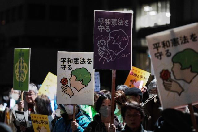 (260228) -- TOKYO, Feb. 28, 2026 (Xinhua) -- People protest during a rally in front of the Prime Minister's Office in Tokyo, Japan, Feb. 27, 2026. In a policy speech on Feb. 20, Japanese Prime Minister Sanae Takaichi reiterated her strong determination to revise the Constitution and outlined plans to fundamentally strengthen Japan's defense capabilities, expand exports of lethal weapons and enhance national intelligence functions, which have sparked criticism and concerns across Japanese society. (Xinhua/Jia Haocheng)