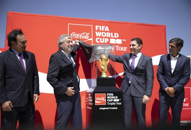 (260228) -- ZUMPANGO, Feb. 28, 2026 (Xinhua) -- Mexico's Foreign Minister Juan Ramon de la Fuente (2nd L) and president of Coca Cola Mexico Louis Balat (2nd R) unveil the FIFA World Cup trophy during the FIFA World Cup Trophy Tour ceremony at the Felipe Angeles International Airport in Zumpango, Mexico, on Feb. 27, 2026. (Xinhua/Str)