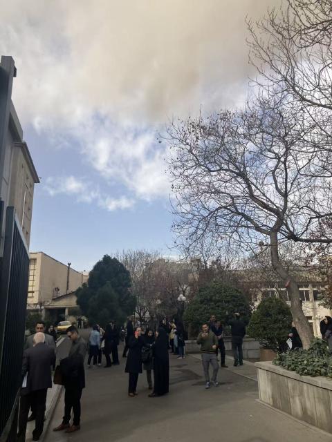 (260228) -- TEHRAN, Feb. 28, 2026 (Xinhua) -- A street near the University of Tehran is cloaked in smoke and dust following attacks in Tehran, Iran, Feb. 28, 2026. The United States and Israel on Saturday launched "major combat operations" against Iran, plunging the war-torn Middle East into a new round of violent conflicts.
   Apparent strikes in Tehran happened near the offices of Supreme Leader Ayatollah Ali Khamenei, according to media reports. Multiple missiles also hit University Street, Jomhouri area and elsewhere in Tehran. Explosions were also heard in Iranian cities, including Isfahan, Qom, Karaj, Kermanshah and Ilam. (Xinhua)