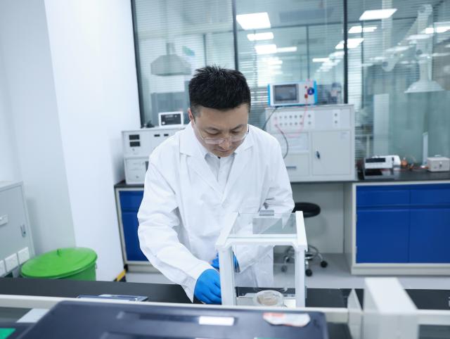 (260228) -- SHANGHAI, Feb. 28, 2026 (Xinhua) -- Zhang Fan observes an experiment at a laboratory of an electrical equipment company of China Electrical Equipment Group in Jinan, east China's Shandong Province, Feb. 13, 2026.
  Zhang Fan is vice general manager of China Electrical Equipment Group and a deputy to the National People's Congress (NPC). Zhang believes that "artificial intelligence (AI) plus manufacturing" would be achieved through strengthening top-level design and industry guidelines. Last year, Zhang presented a suggestion on deepening integration of manufacturing and AI to promote high-quality innovative development. His suggestion was given great importance. 
  In January 2026, eight departments of China including the Ministry of Industry and Information Technology jointly issued a plan which outlines an ambitious push to deeply integrate AI with the manufacturing sector, foster new quality productive forces and comprehensively empower new industrialization.
  Zhang stated that he will continue to concentrate on issues about the bottlenecks of data sharing in AI-driven manufacturing sector and successful experiences of leading enterprises. (China Electrical Equipment Group/Handout via Xinhua)