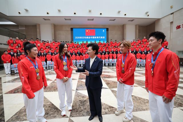(260228) -- BEIJING, Feb. 28, 2026 (Xinhua) -- Chinese State Councilor Shen Yiqin meets with the Chinese delegation for the Milan-Cortina 2026 Olympic Winter Games in Beijing, capital of China, Feb. 28, 2026. (Xinhua/Cao Can)