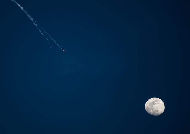 (260301) -- TEL AVIV, March 1, 2026 (Xinhua) -- Missile debris falls after Israeli air defense systems launched interceptor missiles over Tel Aviv, Israel, Feb. 28, 2026. The United States and Israel on Saturday launched "major combat operations" against Iran, plunging the war-torn Middle East into a new round of violent conflicts.
   Iran has retaliated with a series of counterattacks against Israel and U.S. targets across the region, with explosions reported in Bahrain, Qatar, Kuwait, Jordan, the United Arab Emirates (UAE), and Saudi Arabia, among other countries.
   At least two buildings in the greater Tel Aviv region have been hit by Iranian missiles, according to Israel's Ynet news website. So far no fatalities have been reported. (Xinhua/Chen Junqing)