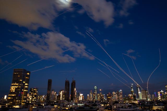(260301) -- TEL AVIV, March 1, 2026 (Xinhua) -- This long exposure photo taken on Feb. 28, 2026 shows flare trails of the interceptor missiles launched from Israeli air defense systems in Tel Aviv, Israel. The United States and Israel on Saturday launched "major combat operations" against Iran, plunging the war-torn Middle East into a new round of violent conflicts.
   Iran has retaliated with a series of counterattacks against Israel and U.S. targets across the region, with explosions reported in Bahrain, Qatar, Kuwait, Jordan, the United Arab Emirates (UAE), and Saudi Arabia, among other countries.
   At least two buildings in the greater Tel Aviv region have been hit by Iranian missiles, according to Israel's Ynet news website. So far no fatalities have been reported. (Xinhua/Chen Junqing)