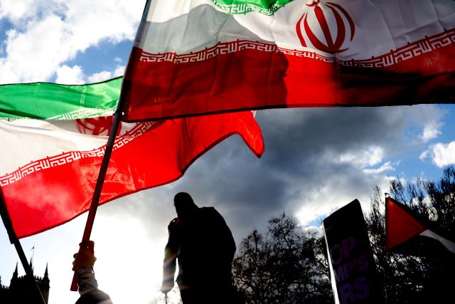 (260301) -- LONDON, March 1, 2026 (Xinhua) -- People hold national flags of Iran in front of the statue of Winston Churchill during a protest against U.S.-Israeli attacks on Iran, at the Parliament Square in central London, Britain, on Feb. 28, 2026. The United States and Israel on Saturday launched "major combat operations" against Iran, plunging the war-torn Middle East into a new round of violent conflicts.
   Iran has retaliated with a series of counterattacks against Israel and U.S. targets across the region, with explosions reported in Bahrain, Qatar, Kuwait, Jordan, the United Arab Emirates (UAE), and Saudi Arabia, among other countries. (Xinhua/Li Ying)