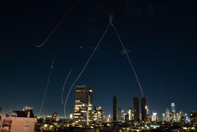 (260301) -- TEL AVIV, March 1, 2026 (Xinhua) -- This long exposure photo taken on Feb. 28, 2026 shows flare trails of the interceptor missiles launched from Israeli air defense systems in Tel Aviv, Israel. The United States and Israel on Saturday launched "major combat operations" against Iran, claiming that the country's Supreme Leader Ayatollah Ali Khamenei had been killed.
  Iran retaliated with a series of counterattacks against Israel and U.S. targets across the region
  Late Saturday, at least 20 people were injured in Tel Aviv during Iran's latest round of strikes on Israel, Israel's national emergency service MDA reported. MDA said that a 40-year-old man is in a serious condition with a shrapnel wound. (Xinhua/Chen Junqing)