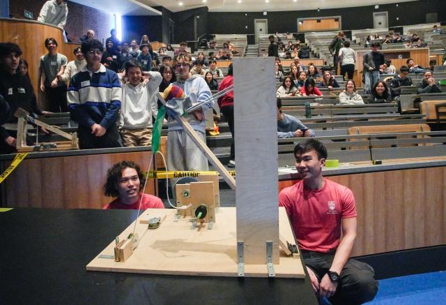 (260301) -- VANCOUVER, March 1, 2026 (Xinhua) -- Students look at their projectile launcher in action during the 48th annual Physics Olympics at the University of British Columbia in Vancouver, British Columbia, Canada, on Feb. 28, 2026. More than 1,000 high school students from across the Canadian province of British Columbia participated in the 48th annual Physics Olympics held here on Saturday. (Photo by Liang Sen/Xinhua)