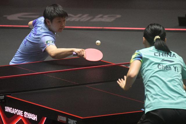 (260301) -- SINGAPORE, March 1, 2026 (Xinhua) -- Sun Yingsha (L) hits a return during the women's singles semifinal between Sun Yingsha of China and Chen Yi of China at the World Table Tennis (WTT) Singapore Smash 2026 in Singapore on March 1, 2026. (Photo by Then Chih Wey/Xinhua)