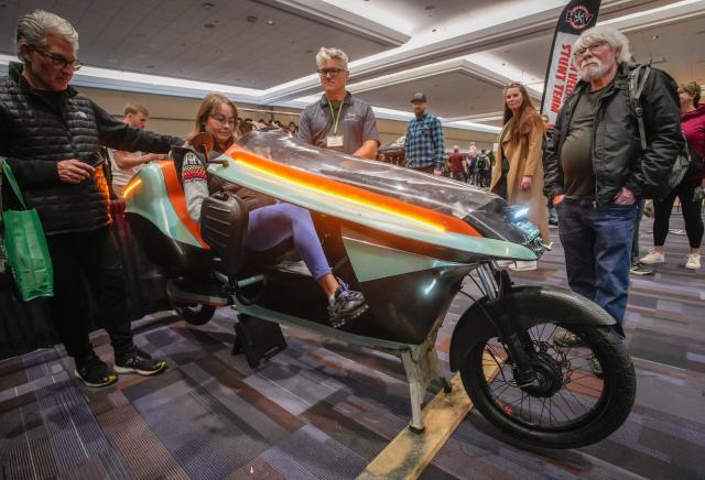 (260301) -- VANCOUVER, March 1, 2026 (Xinhua) -- A woman sits in an electric-assist tricycle during the 2026 BC Bike Show in Vancouver, British Columbia, Canada, on Feb. 28, 2026. The two-day bicycle consumer show showcased the latest products from around 60 exhibitors. (Photo by Liang Sen/ Xinhua)