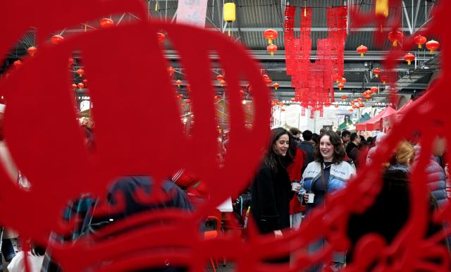 (260301) -- LONDON, March 1, 2026 (Xinhua) -- People attend an event in celebration of the upcoming Lantern Festival in London, Britain, Feb. 28, 2026. (Xinhua/Li Ying)