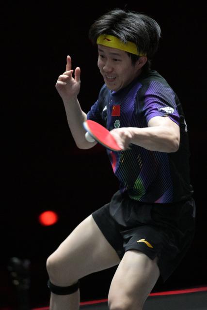 (260301) -- SINGAPORE, March 1, 2026 (Xinhua) -- Wang Chuqin hits a return during the men's singles semifinal between Wang Chuqin of China and Felix Lebrun of France at the World Table Tennis (WTT) Singapore Smash 2026 in Singapore on March 1, 2026. (Photo by Then Chih Wey/Xinhua)