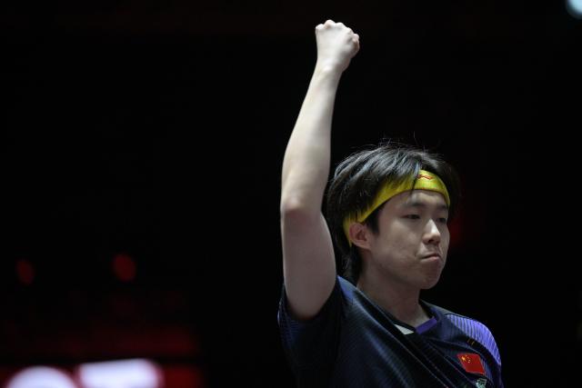 (260301) -- SINGAPORE, March 1, 2026 (Xinhua) -- Wang Chuqin celebrates during the men's singles semifinal between Wang Chuqin of China and Felix Lebrun of France at the World Table Tennis (WTT) Singapore Smash 2026 in Singapore on March 1, 2026. (Photo by Then Chih Wey/Xinhua)