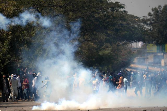 (260301) -- KARACHI, March 1, 2026 (Xinhua) -- Protesters clash with law enforcement personnel near U.S. Consulate in southern Pakistani port city of Karachi on March 1, 2026. At least nine people were killed and more than 12 others injured on Sunday as angry protesters clashed with law enforcement personnel outside the U.S. Consulate in Karachi in the southern Sindh province, rescue officials said. (Photo by Imran Ali/Xinhua)