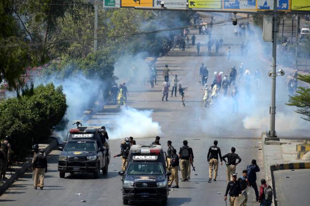 (260301) -- KARACHI, March 1, 2026 (Xinhua) -- Protesters clash with law enforcement personnel near U.S. Consulate in southern Pakistani port city of Karachi on March 1, 2026. At least nine people were killed and more than 12 others injured on Sunday as angry protesters clashed with law enforcement personnel outside the U.S. Consulate in Karachi in the southern Sindh province, rescue officials said. (Photo by Imran Ali/Xinhua)